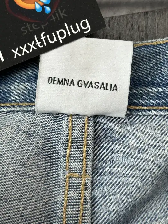 Vetements VETEMENTS FW19 Demna Anarchy Logo Distressed Blue Jeans, detail view 17