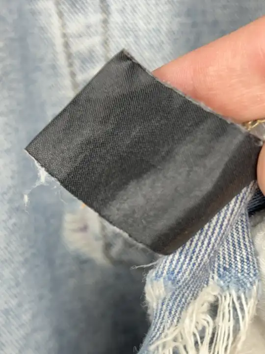 Vetements VETEMENTS FW19 Demna Anarchy Logo Distressed Blue Jeans, detail view 21
